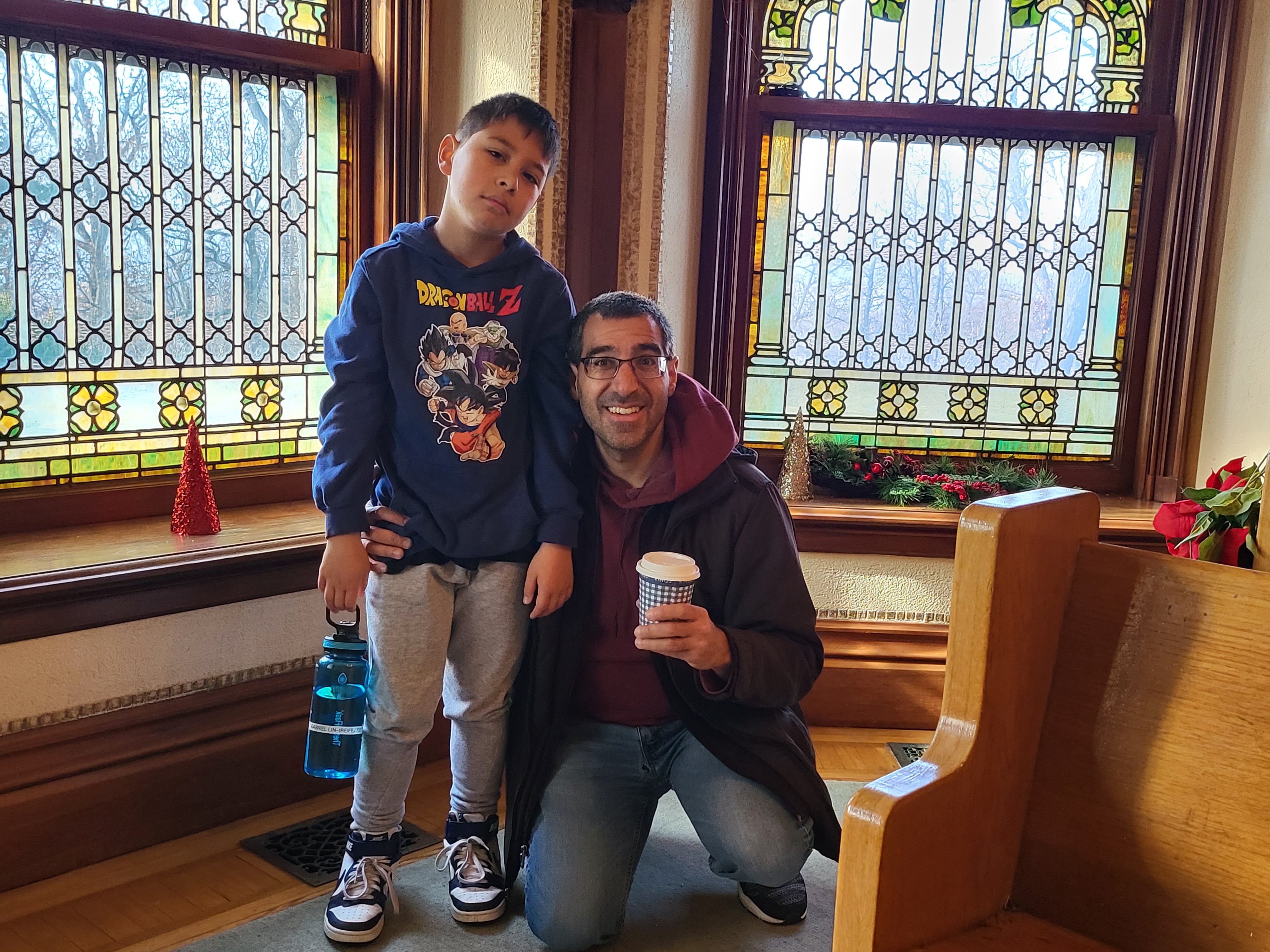 Paul and his son at church