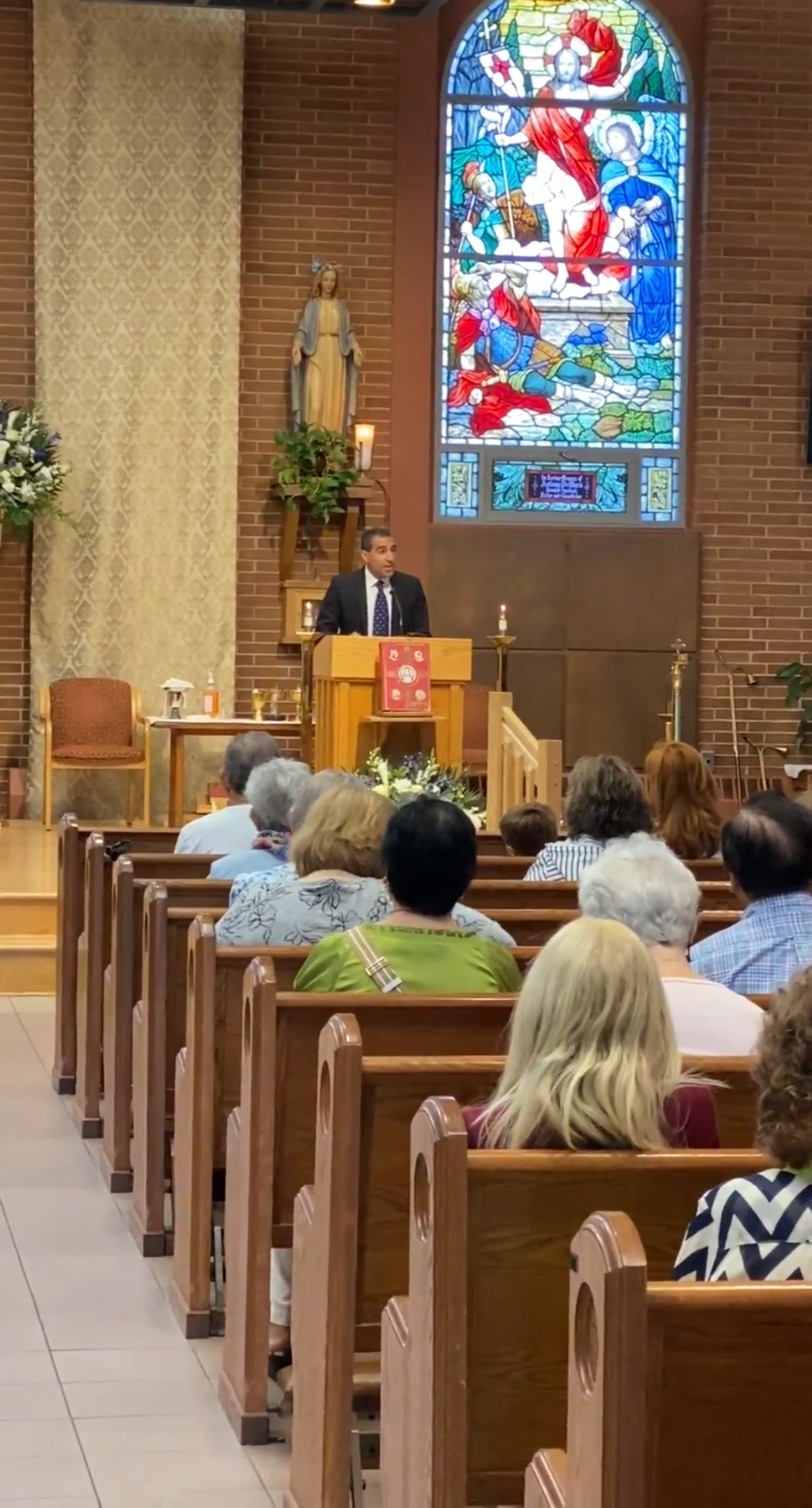 Paul presenting Pray Over Us at church